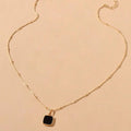 Shein Black & Gold Pendant - 