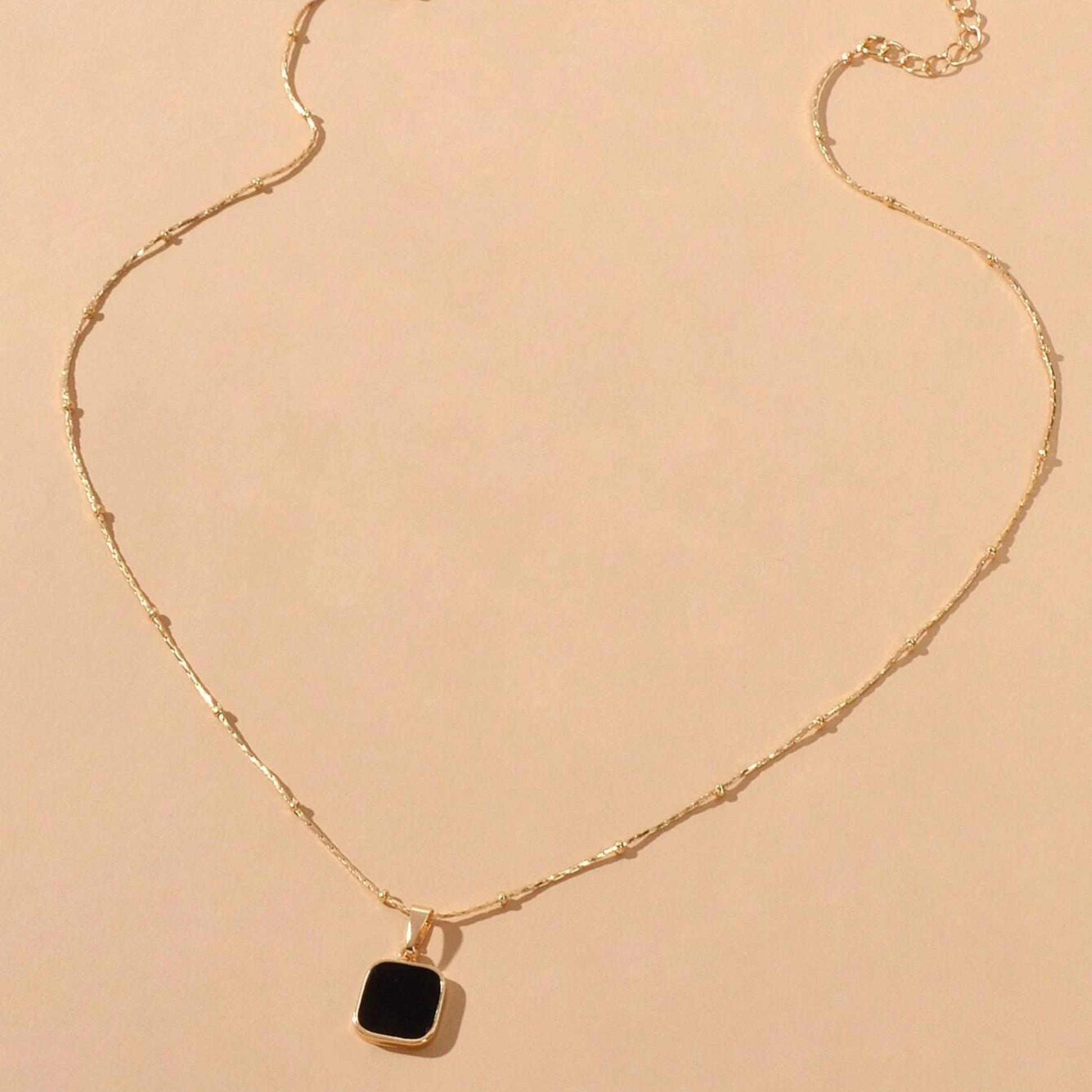 Shein Black & Gold Pendant - 
